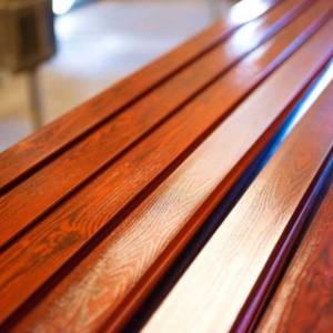 Wood finish for metal surfaces